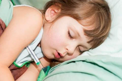 Sick child spleeping Stock Photos