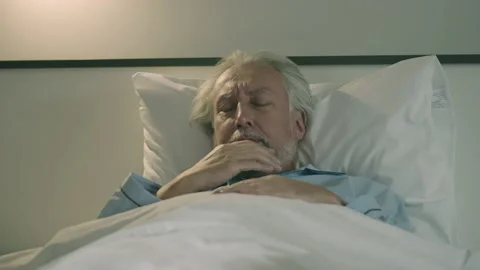 Sick elderly man coughing in bed suffering lung disease fever, health problem Stock Footage 167225613
