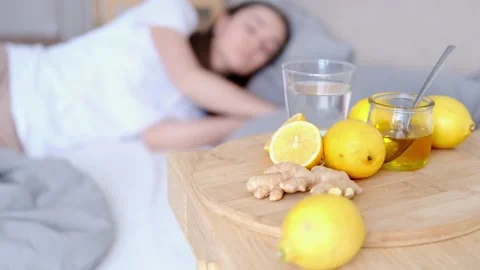 Sick girl in bed in the background Stock Footage 169183245