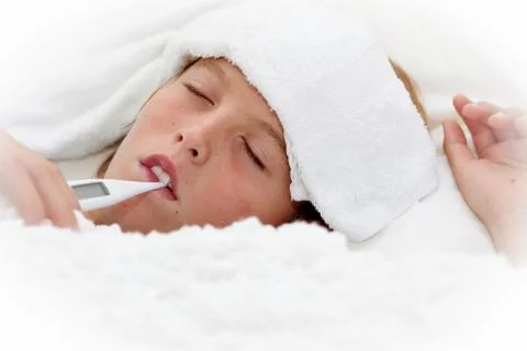 Sick ill child with thermometer Stock Photos