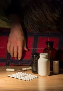 Sick man in a bed Stock Photos