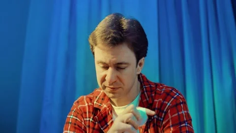 Sick man blowing his nose into a tissue, suffering from seasonal cold and flu sy Stock Footage 343752693