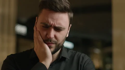 Sick man Caucasian guy touch painful cheek feel dental pain toothache teeth 스톡 동영상 243451786