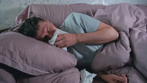 Sick man with cold, flu or virus illness with cough and running nose Stock Footage 236638728