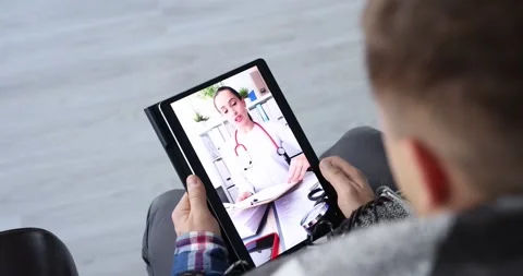 Sick man communicates by video call with doctor slow motion 4k movie Stock Footage 165826231