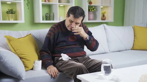 The sick man is sneezing. Stock Footage 234108732