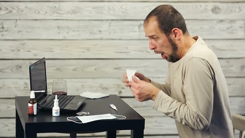 Sick man working at the computer Stock Footage 108201966