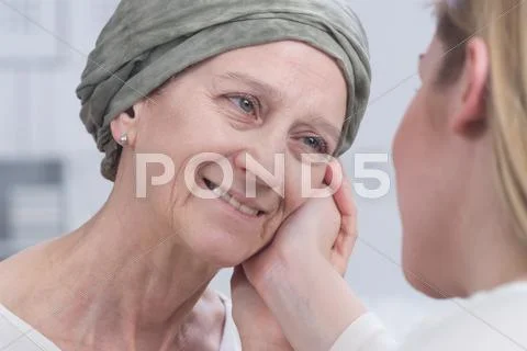 Sick mother and supportive daughter Stock Photos