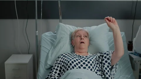 Sick patient with breathing problems asking for medical assistance Stock Footage 162924951