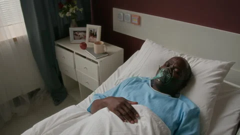 Sick Senior Man, Wearing Oxygen Mask, Lying on Single Bed in Hospital Ward Stock Footage 293805577