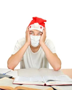 Sick Student in Santas Hat Stock Photos