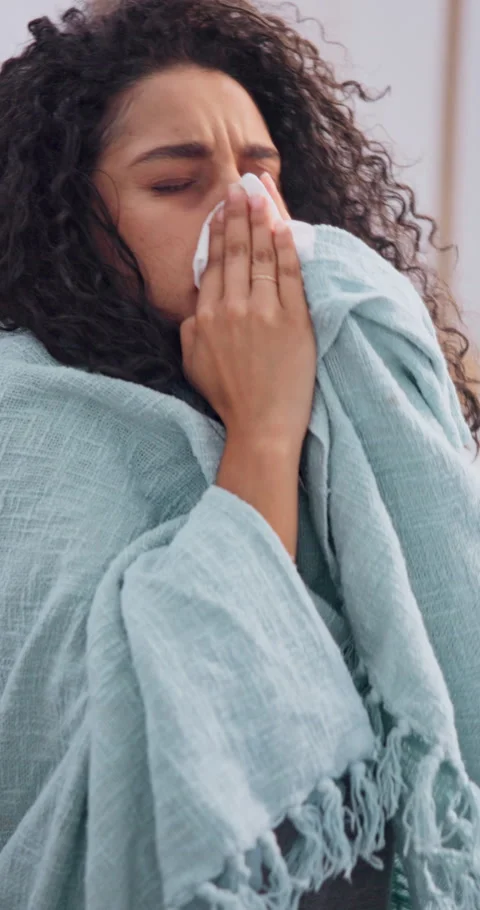 Sick, tissue and blowing nose with woman in home for influenza, viral infection Stock Footage 340775313