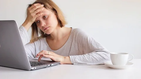 Sick woman using a computer Stock Footage 109205682