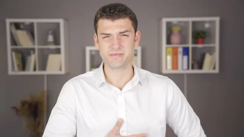 Sick young man coughing. Stock-Footage 220162820