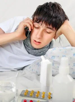 Sick Young Man with Flu Stock Photos