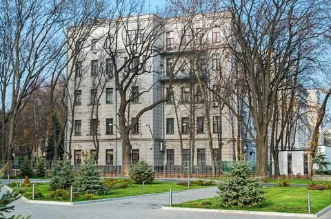 Side of administrative building is surrounded by front garden Stock Photos