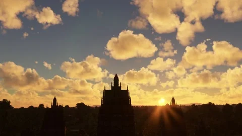 Side aerial drone view at sunset of the Prambanan Temple Compounds. Indonesia 動画素材 241840890
