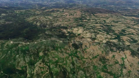 Side aerial drone view of Wind Farm in Serra do Alvao. Portugal Stock Footage 269631450