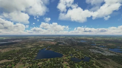 Side aerial view of Bok Tower Gardens - Lake Wales in Florida. United States Stock Footage 249456516