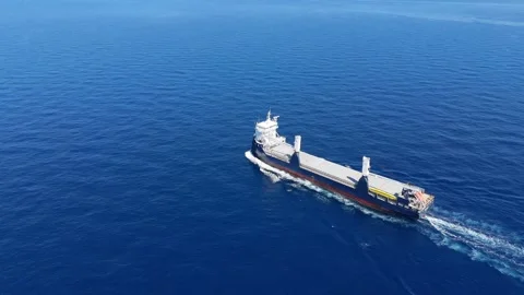 Side aerial view of large cargo vessel sailing Stock Footage 335665822