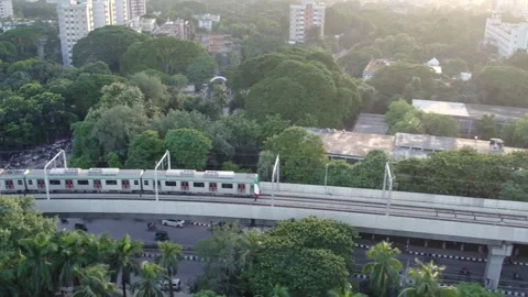 Side Aerial View of Metro Train on Elevated Tracks in Dhaka Stock Footage 338081595