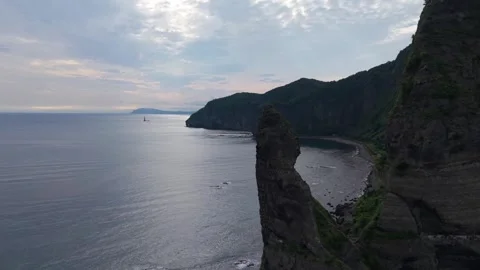 Side Aerial View of Seta Kamui Rock and Coastline in Yoichi Hokkaido – 4K Stock Footage 321989889