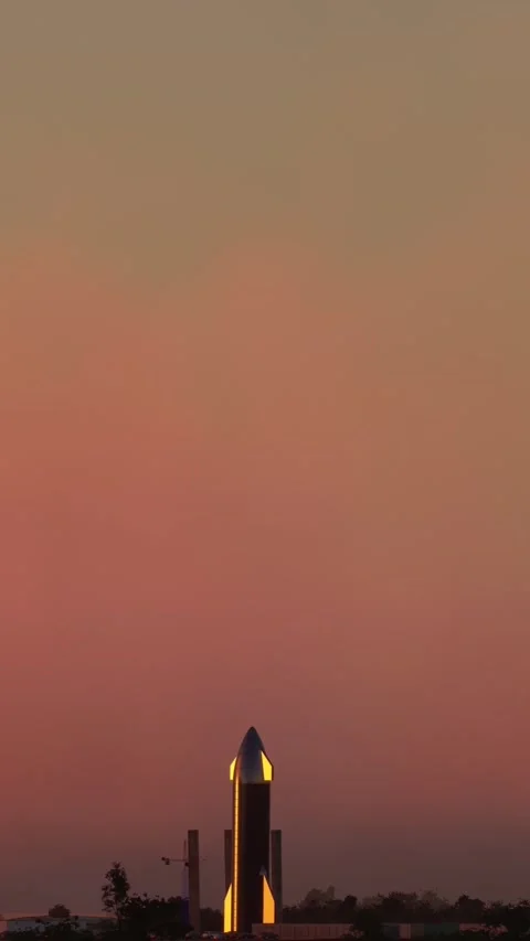 Side aerial view of the Space Rocket at the Boca Chica Launch Site. Texas. USA Stock Footage 284489417