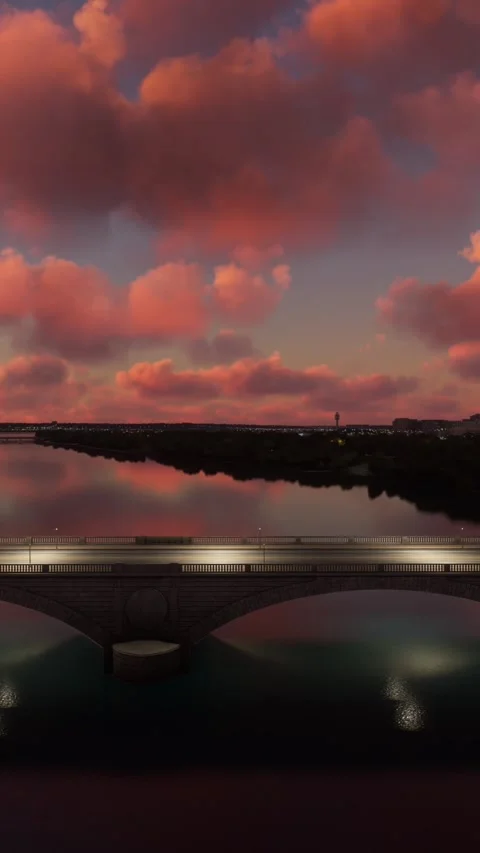 Side aerial view at sunset of the Arlington Memorial Bridge in Washington D.C. Video stock 284883867