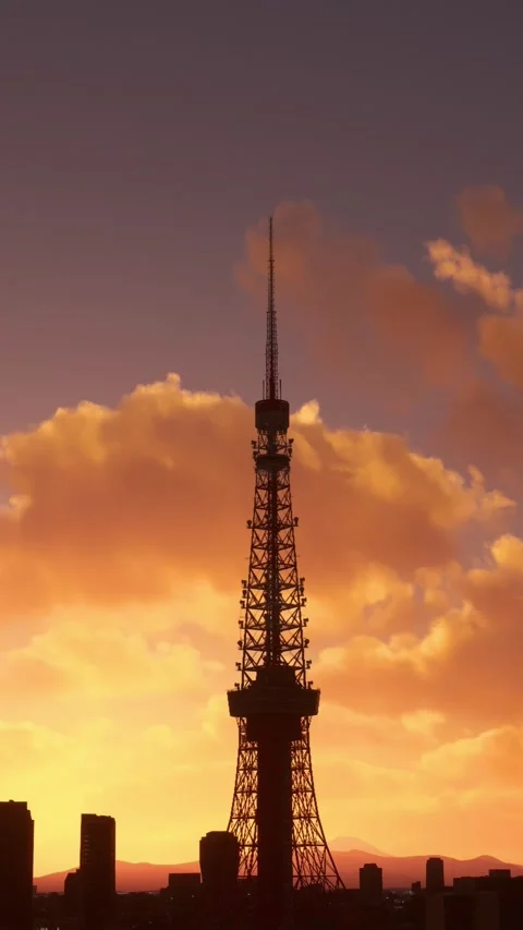 Side aerial view at sunset of Tokyo Tower. Japan Stock Footage 284488892