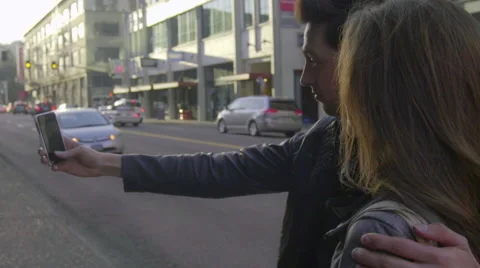 In side angle, cute couple take photo of themselves Stock Footage 62464991