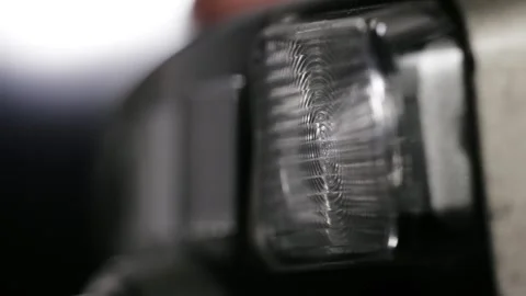Side Angle Flash Firing On Vintage Point And Shoot Camera Stock Footage 321378854