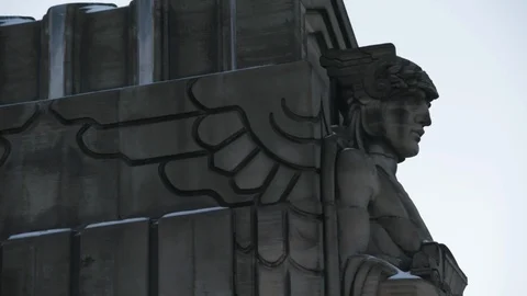 Side Angle of Loraine Carnegie Bridge Guardians of Transportation Statue Stock Footage 89980720