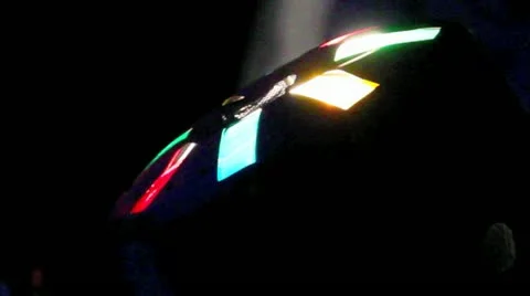 Side Angle Multi-Colored Round Night Club Light Close-up Black Background Stock Footage 12411272