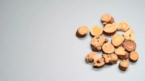 Side angle pan view herb GanCao or Glycyrrhizae Radix et Rhizoma or Liquorice Stock Footage 145831555