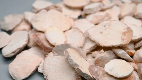 Side angle pan view herb ShengBanXia or Pinelliae Rhizoma or raw Ternate Pine Stock Footage 145869186