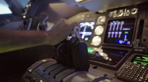 Side angle view of airline pilot's hand using throttle 4K Stock Footage 53131433