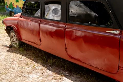 Side Angle View of Customized Red Handmade Stretch Limousine Stock-Fotos