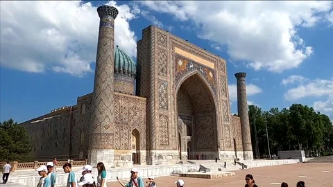 Side angle view of the historic Sher-Dor Madrasa in Samarkand Stock Footage 336913567