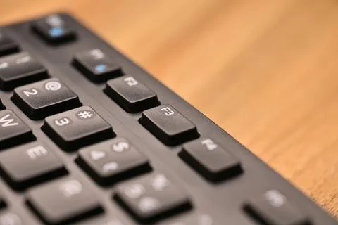 Side Angled Top View Macro Close-Up Black Computer Keyboard Highlighting F3.. Stock Photos