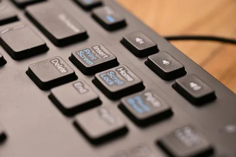 Side Angled Top View Macro Close-Up Black Computer Keyboard Highlighting Ho.. Stock Photos