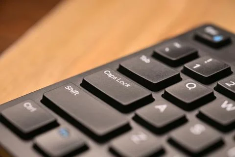 Side Angled Top View Macro Close-Up Black Computer Keyboard Highlighting Ca.. Stock Photos