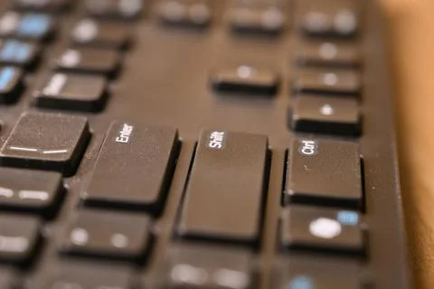 Side Angled Top View Macro Close-Up Black Computer Keyboard Highlighting Sh.. Stock Photos