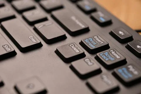 Side Angled Top View Macro Close-Up Black Computer Keyboard Highlighting De.. Stock Photos