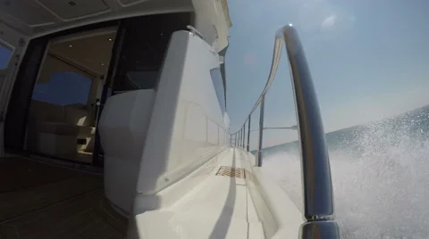 Side on board view of a boat navigating Stock Footage 62568807