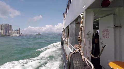 Side Boat Shot, View of City and Skyscrapers From The Ferry, Hong Kong Island Stock Footage 214007791