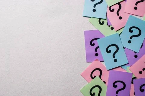 Side border of colorful question marks Foto stock