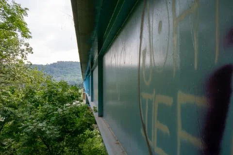 The Side of a Bridge Covered in Graffiti Stock Photos