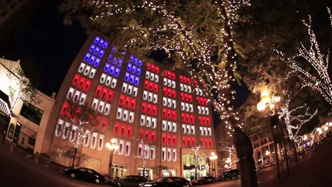 Side of a Building Lit Up With the American Flag 스톡 동영상 148344101