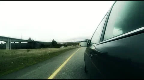 Side of the car drives on freeway Stock Footage 22070043