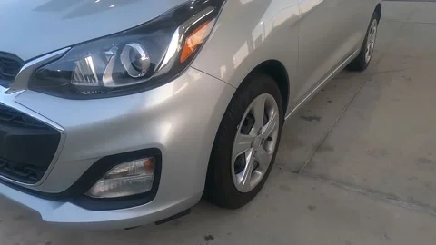 Side of a car pumping gas Stockbeeldmateriaal 156133591